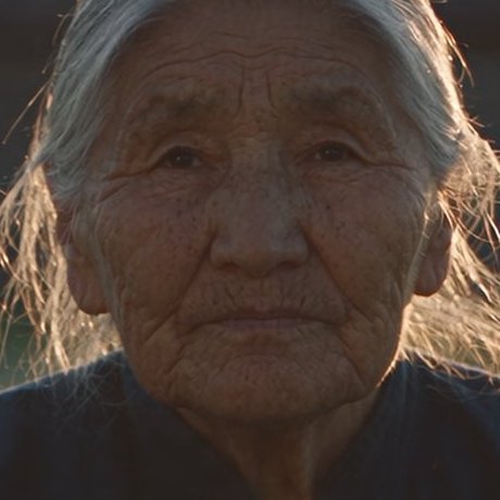 An older woman at sunset