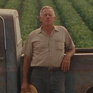 A farmer by his truck
